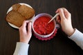 bowl of beet root soup borsch on dark wooden table with bread in plate, traditional Ukrainian or Russian soup borscht