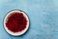 Bowl of beetroot cut into thin strips on blue painted wooden background. Vegetarian, organic, healthy food, diet, nutrition. Top