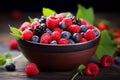 A bowl of berries on a table