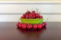 Bowl of Bing Cherries on Wood Table