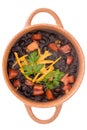 Bowl of black bean soup garnished with cheese Royalty Free Stock Photo