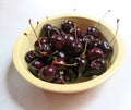 Bowl of black cherries Royalty Free Stock Photo