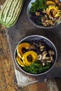 Black rice with roasted delicata squash, massaged kale and shiitake mushrooms Royalty Free Stock Photo