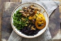 Black rice with roasted delicata squash, massaged kale and shiitake mushrooms Royalty Free Stock Photo