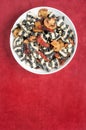 Bowl of Black and White Pasta on Rust Suede Background, Vertical Royalty Free Stock Photo