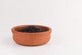 Bowl of black wild rice isolated on white Royalty Free Stock Photo