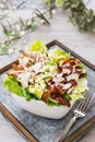 Bowl of BLT salad with lettuce, meat, bacon and avocados Royalty Free Stock Photo