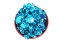 A Bowl of Blue Wrapped Candy on a White Background Royalty Free Stock Photo