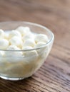 Bowl of Bocconcini mozzarella on the wooden table