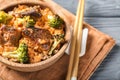 Bowl with boiled rice, meat and broccoli on table Royalty Free Stock Photo
