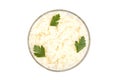 bowl of boiled rice with parsley isolated on white background, top view Royalty Free Stock Photo