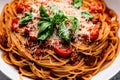 A bowl of Bolognese sauce, served on a bed of perfectly cooked pasta and garnished with a sprinkle of freshly grated Parmesan