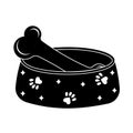 A bowl with a bone for dogs and cats. Vector illustration of an isolated black icon. Royalty Free Stock Photo