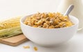 Bowl of Breakfast Cereal with Corn Cob. Royalty Free Stock Photo