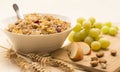 Bowl of Breakfast Cereal, Fresh Fruit and Wheat Stalks. Royalty Free Stock Photo