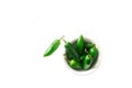 A bowl of bright green jalapeno peppers on a white background isolated with copy space Royalty Free Stock Photo