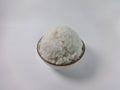 A bowl brimming with cooked white rice, showcased against a plain background Royalty Free Stock Photo