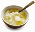 Bowl of Buttery Grits with Clipping Path Over White