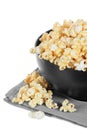 Bowl of buttery popcorn isolated