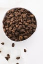 Bowl of coffee beans on a white background Royalty Free Stock Photo