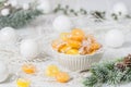 Bowl with candies in the form of orange and lemon slices, individually wrapped in foil Royalty Free Stock Photo