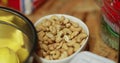 A bowl of cashew nuts on the table among other foods ready to be prepared Royalty Free Stock Photo