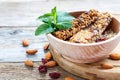 Bowl of cereal bars, nuts, dried fruits and honey. Royalty Free Stock Photo