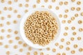 Bowl with cereal cheerios isolated on white background Royalty Free Stock Photo