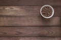 Bowl with cereal chocolate balls on a wooden table . Top view Royalty Free Stock Photo