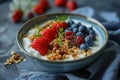 a bowl of cereal, granola, berries and chia seeds