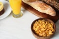 Bowl of cereal, orange juice and toast Royalty Free Stock Photo