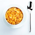 Bowl of cereal and spoon set for breakfast Royalty Free Stock Photo