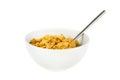 Bowl of cereal with spoon on white Royalty Free Stock Photo