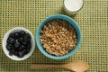 Bowl of cereals and blueberries with glass of yogurt for breakfast Royalty Free Stock Photo