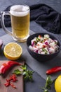 A bowl of ceviche and a mug of cold beer Royalty Free Stock Photo