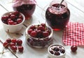 Bowl of cherries and homemade jam in jar Royalty Free Stock Photo