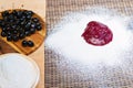 A bowl of cherries next to a bowl of powdered sugar. Mochi asian dessert Royalty Free Stock Photo