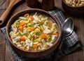 Bowl of chicken noodle soup with carrots and dill Royalty Free Stock Photo