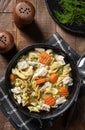 Bowl of chicken noodle soup on a wooden table Royalty Free Stock Photo