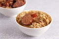 Bowl of Chicken and Sausage Gumbo with Red Beans and Rice with Sausage on the Side Royalty Free Stock Photo