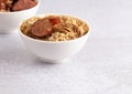 Bowl of Chicken and Sausage Gumbo with Red Beans and Rice with Sausage on the Side Royalty Free Stock Photo