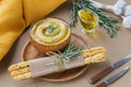 A bowl of chickpeas homemade hummus with olive oil, rosemary and crispbread