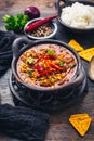 Bowl of chili con carne with rice and toppings Royalty Free Stock Photo