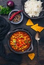 Bowl of chili con carne with rice and toppings Royalty Free Stock Photo