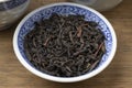 Bowl with Chinese Lapsang souchong tea close up