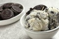 Bowl of chocolate cookies ice cream on table, closeup. Royalty Free Stock Photo