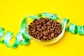 Bowl with chocolate corn flakes. green centimeter tape, healthy eating, diet