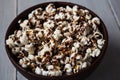 Bowl with chocolate popcorn on wood Royalty Free Stock Photo