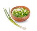 Bowl of chopped spring onions isolated on white background Royalty Free Stock Photo