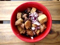 Bowl of chopped tofu and pork in soy sauce